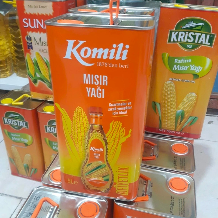 روغن ذرت برند کومیلی اصلی ، محصول وارداتی از ترکیه ، بسته بندی حلب ۵ لیتری اورجینال